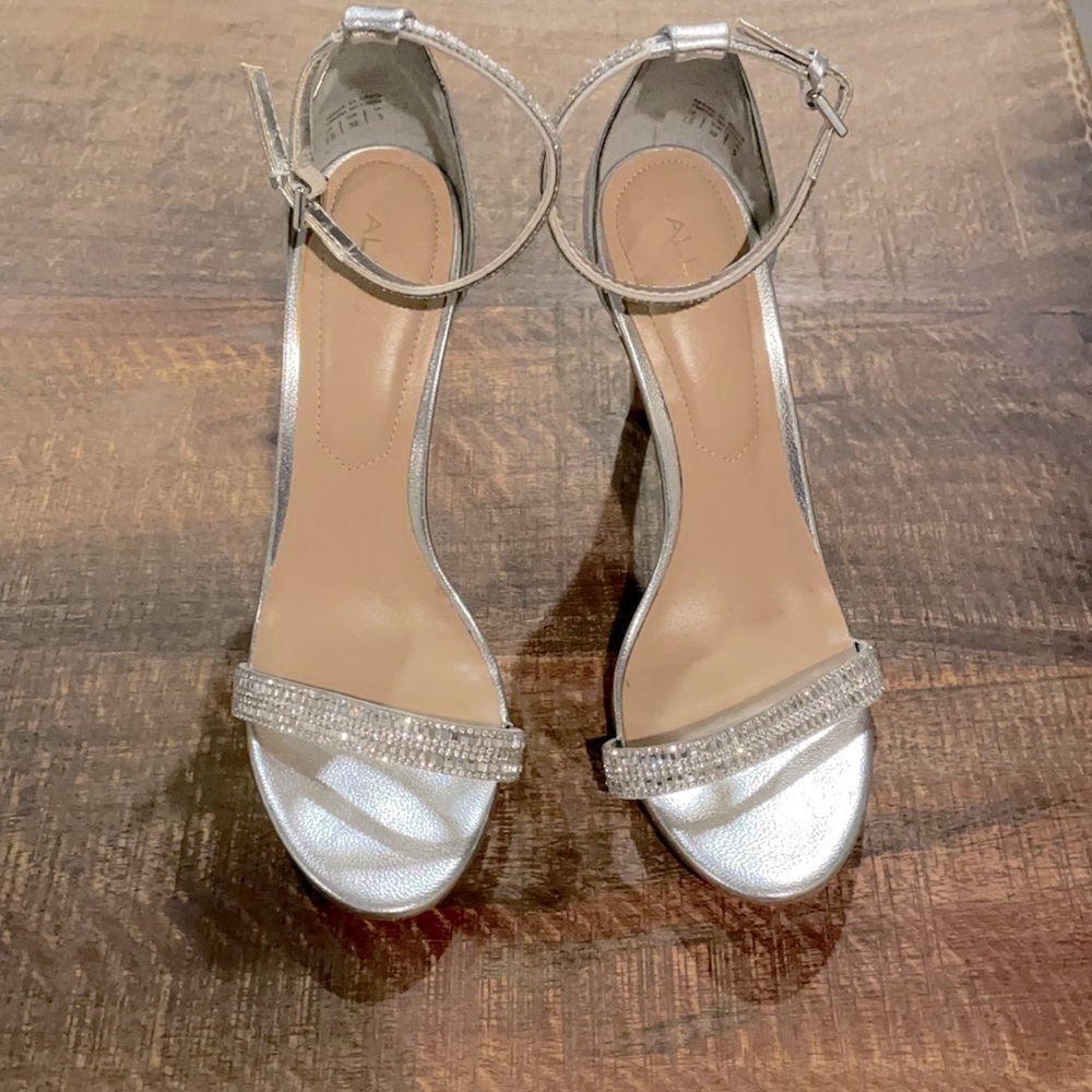 Silver Aldo heels.